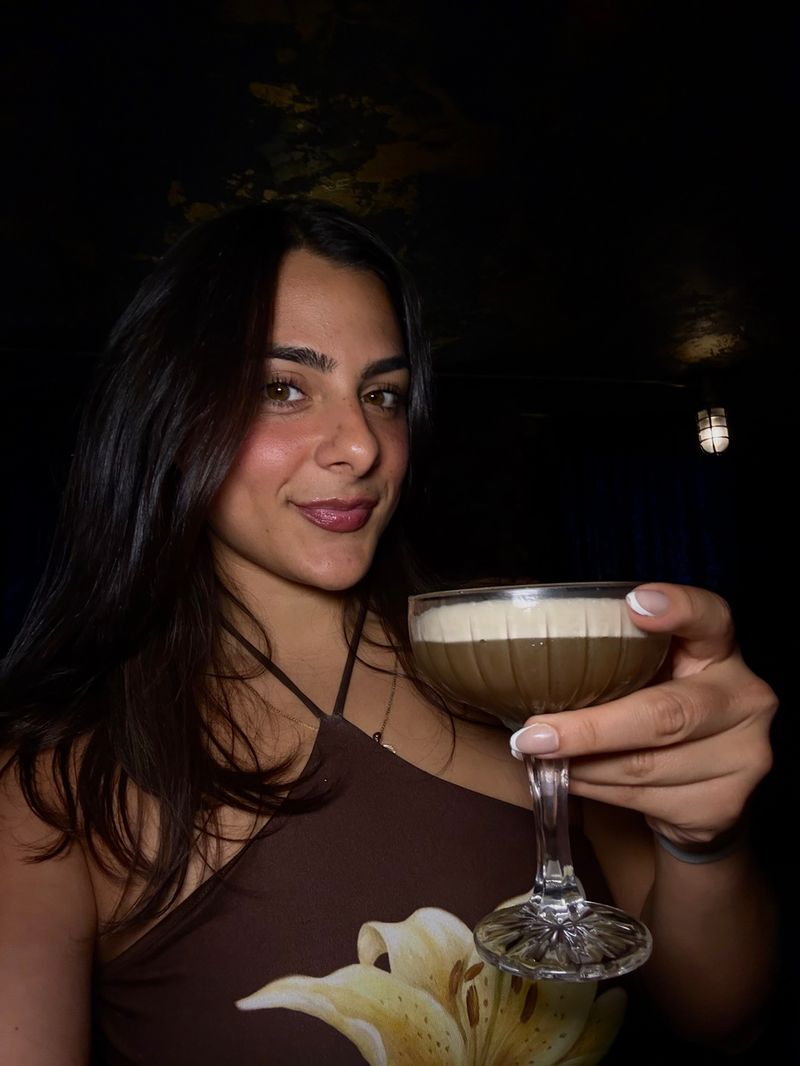 Julia holding an espresso martini